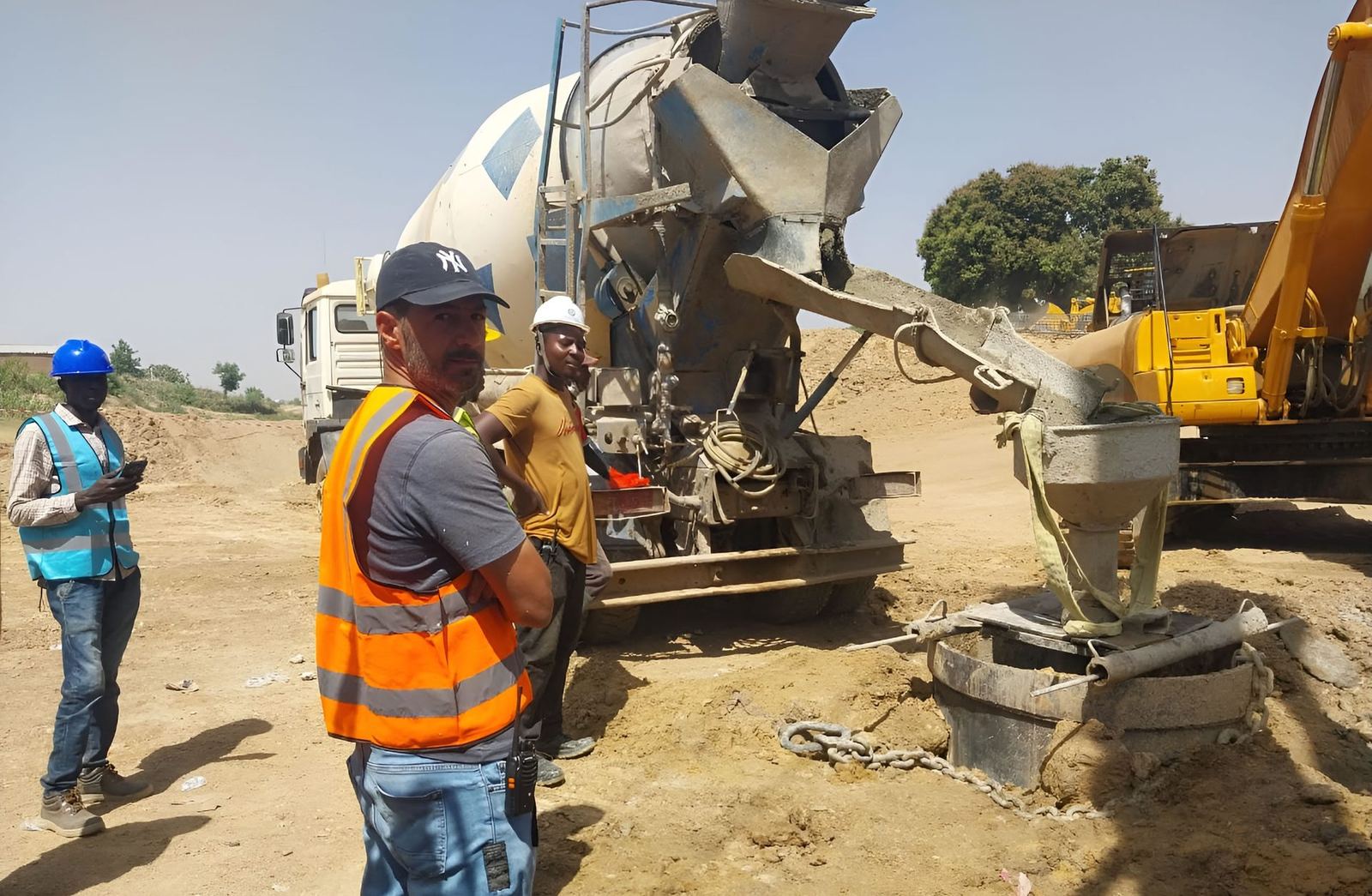 Cigeotech site team supervising a concrete pour for foundation works